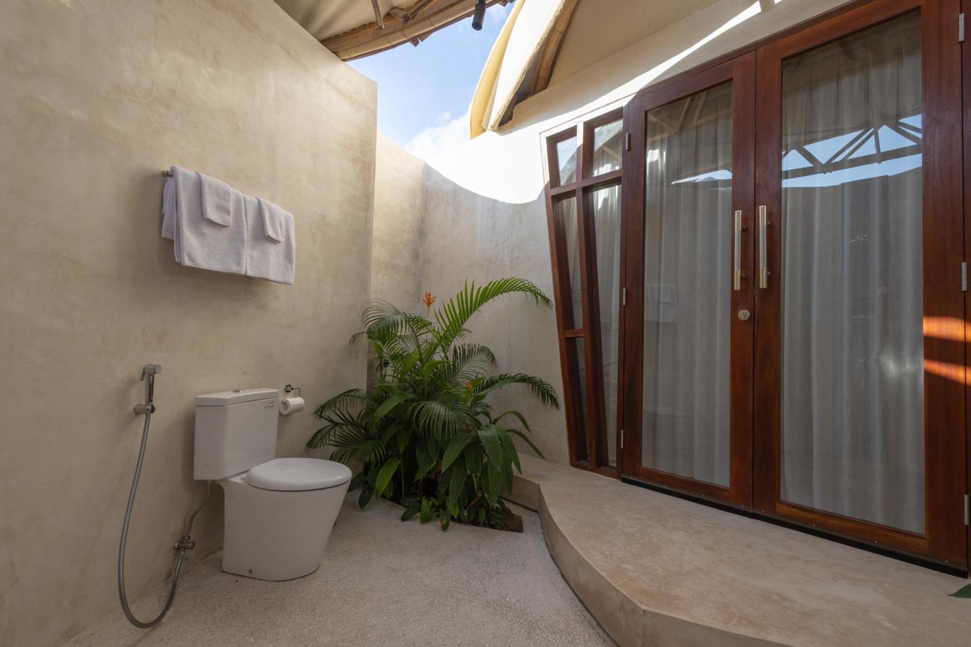 Nuanu Suites & Accommodations Tanah Lot Værelse billede